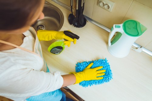 Freshly cleaned bathroom and kitchen surfaces in a Camden move-in clean